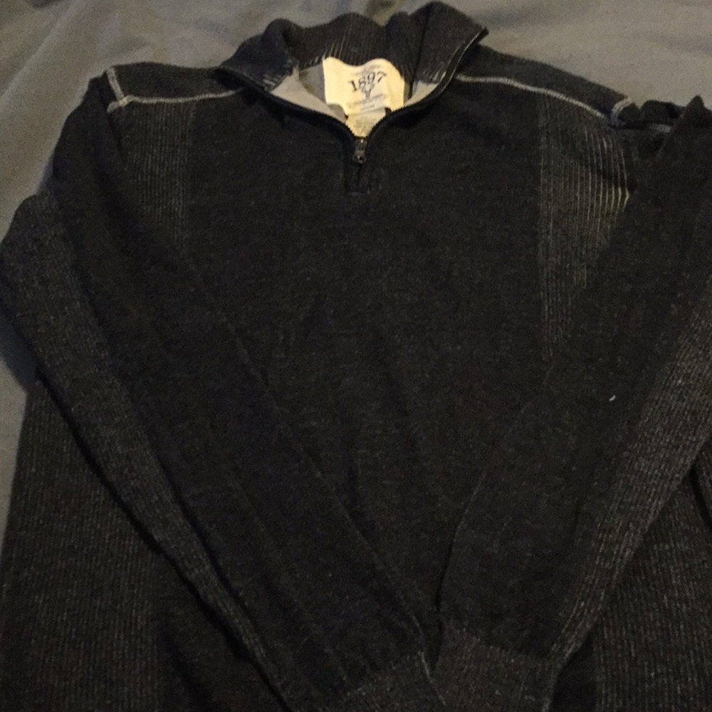 Black and cream men’s Authentic Goods sweater